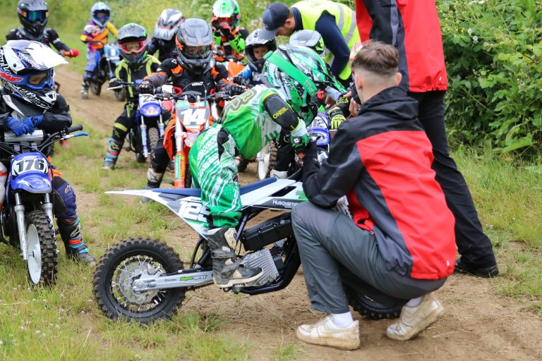 Child learning how to ride a motorbike