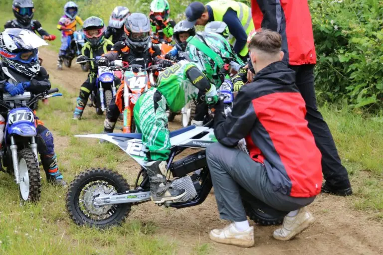Child learning how to ride a motorbike